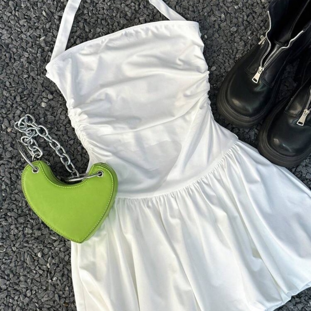 White Dress with Green Heart Bag and Black Boots